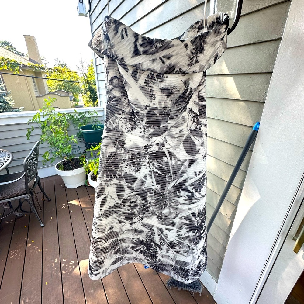 Beautiful and whimsical Theia party dress.